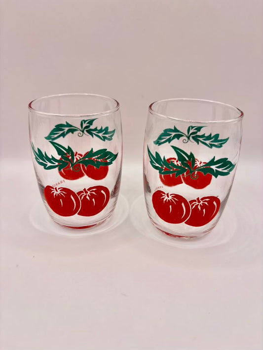 Pair of French tomato juice glasses front view
