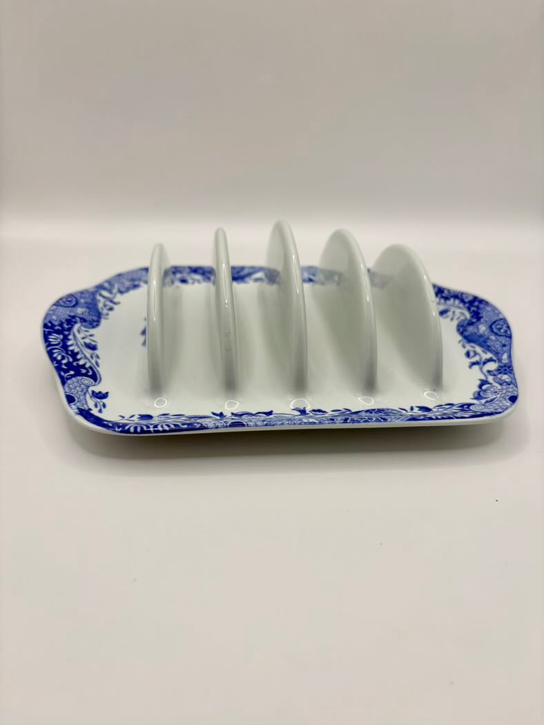 Ceramic toast rack with blue floral pattern on a white background