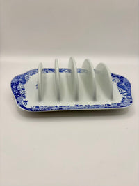 Ceramic toast rack with blue floral pattern on a white background