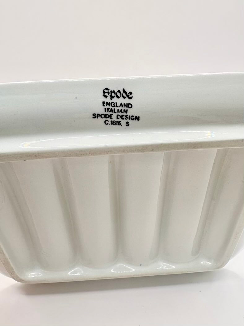 White ceramic dish with 'Spode' branding on a white background