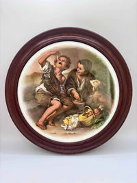 Round porcelain Plaque by Murillo Boys with wooden frame