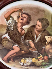 Round porcelain Plaque by Murillo Boys with wooden frame