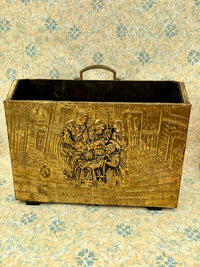 Vintage embossed brass magazine rack featuring a 1960s tavern scene
