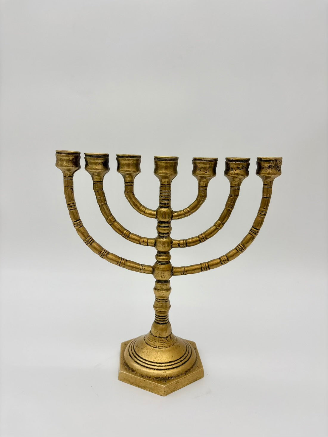 Brass Menorah on a white background