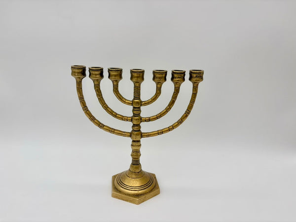 Brass Menorah on a white background