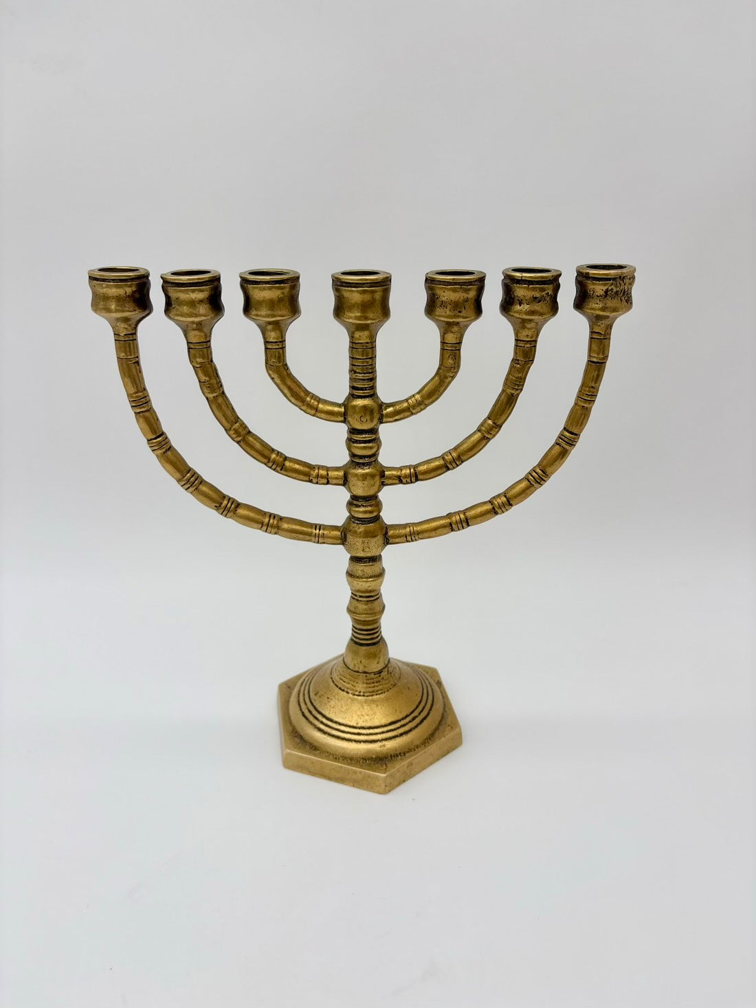 Brass Menorah on a white background