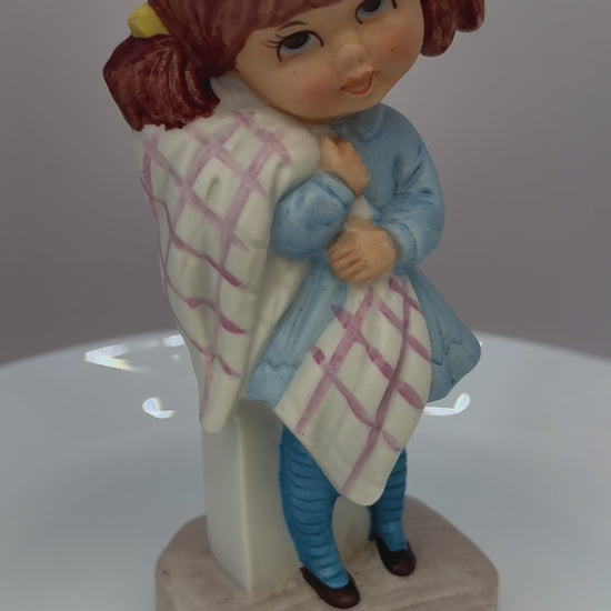 video of 1970s Little Girl Figurine