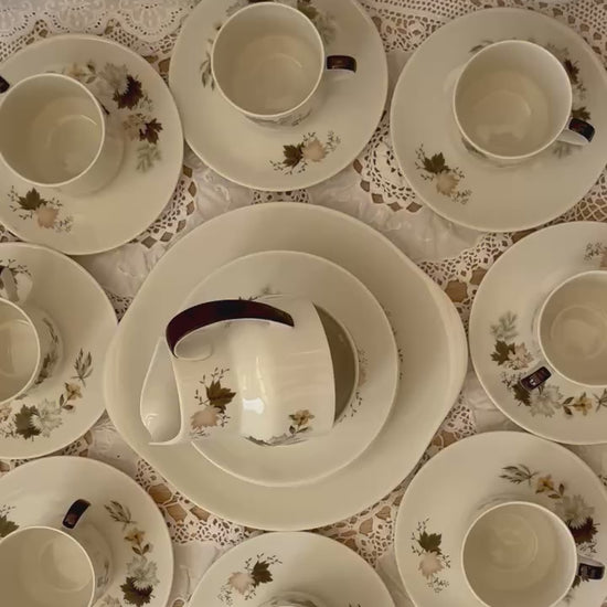Royal Doulton Westwood 1950s vintage china tea set with floral design, 27 pieces including cups, platter, sugar bowl, and milk jug