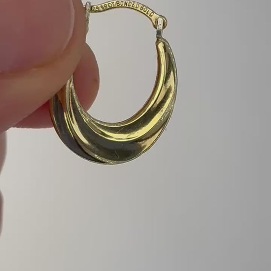 Pair of 9ct bonded gold sterling silver hoop earrings on neutral background