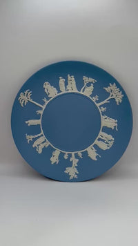 Blue Wedgwood Jasperware plate with neoclassical white relief detail
