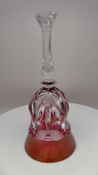 Vintage red and clear crystal bell ornament without ringer on display
