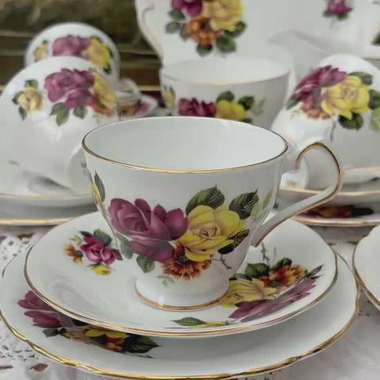video of Royal Windsor fine bone china tea set with bright pink and yellow rose bouquets, vintage English porcelain