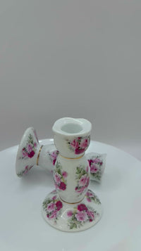 A pair of Leonardo Collection Pretty Bone China Cottage Rose Pattern Candlesticks