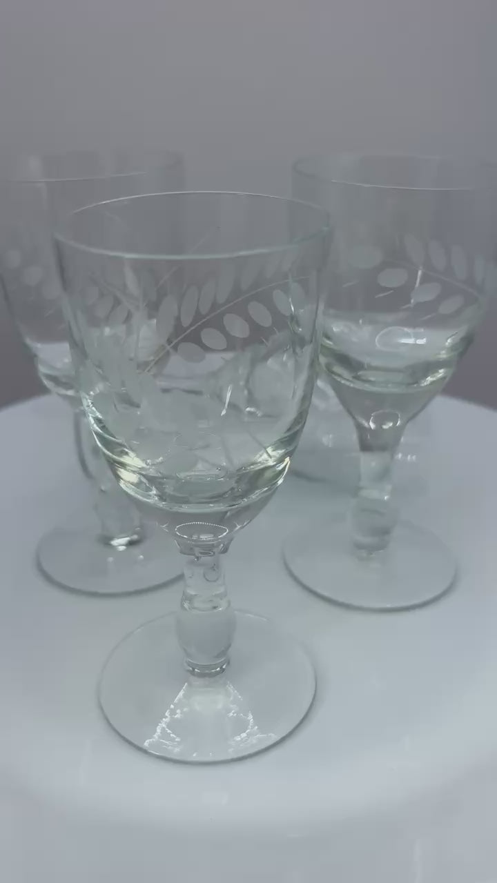 Set of four vintage etched limoncello glasses on a stem, perfect for elegant barware or liqueur tasting