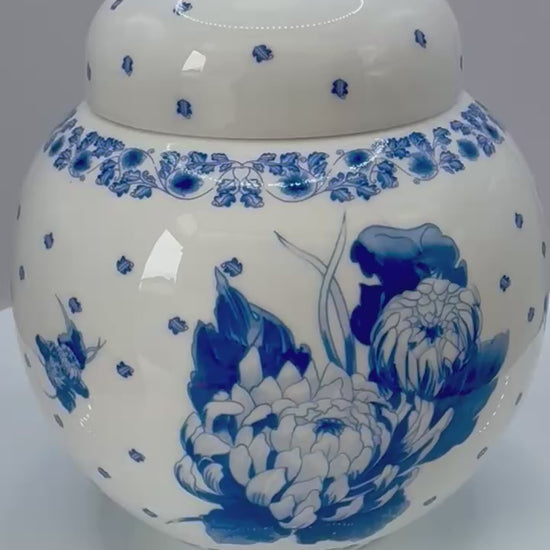 Vintage Ringtons bone china ginger jar with blue and white chrysanthemum design and lid