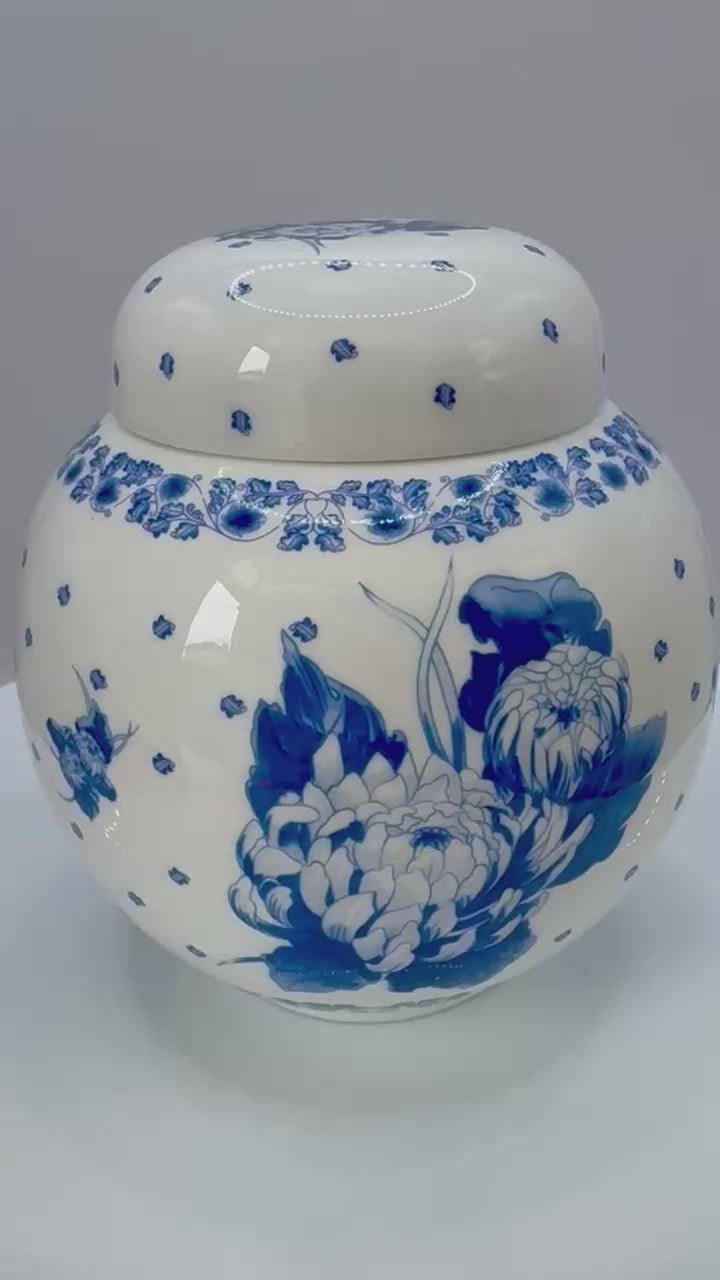 Vintage Ringtons bone china ginger jar with blue and white chrysanthemum design and lid