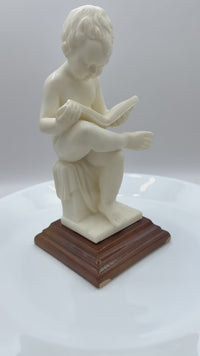 Alabaster Sculpture Of Child Reading A Book