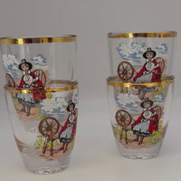 Set of six 1960s Welsh shot glasses featuring a spinning‑wheel girl motif