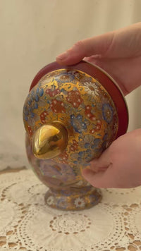 Rotating view of Japanese Satsuma lidded urn showing all sides