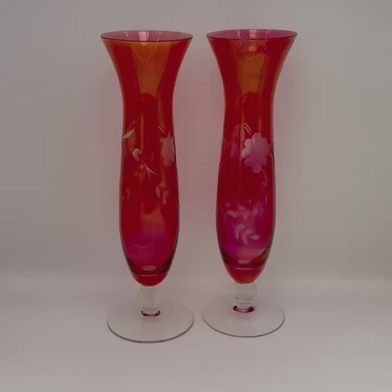 Pair of vintage cranberry etched glass bud vases with clear pedestal base