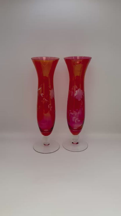 Pair of vintage cranberry etched glass bud vases with clear pedestal base