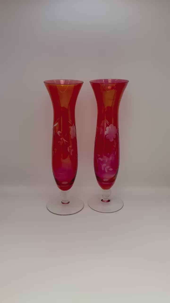 Pair of vintage cranberry etched glass bud vases with clear pedestal base