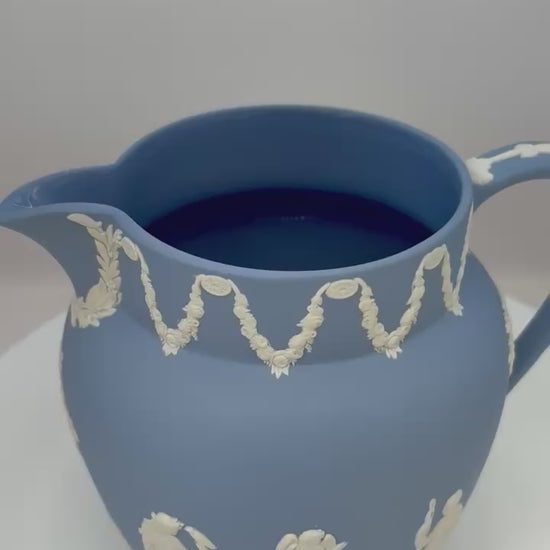 Vintage 1954 Wedgwood blue and white jasperware pitcher with neoclassical design