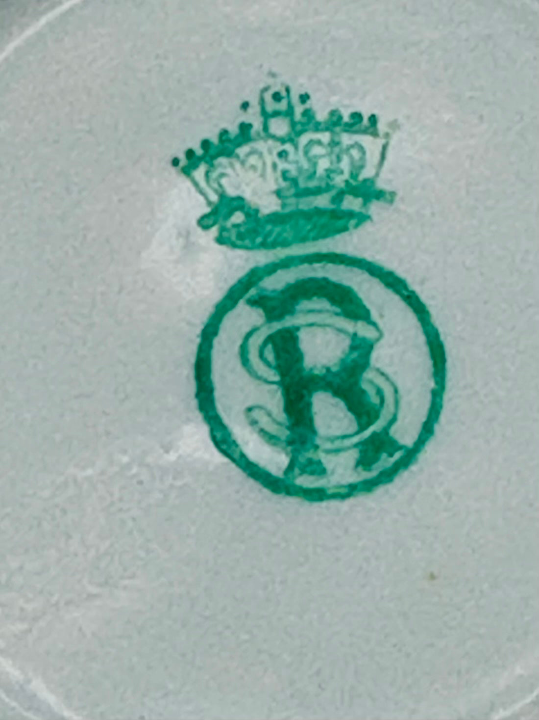 Green logo on a white background