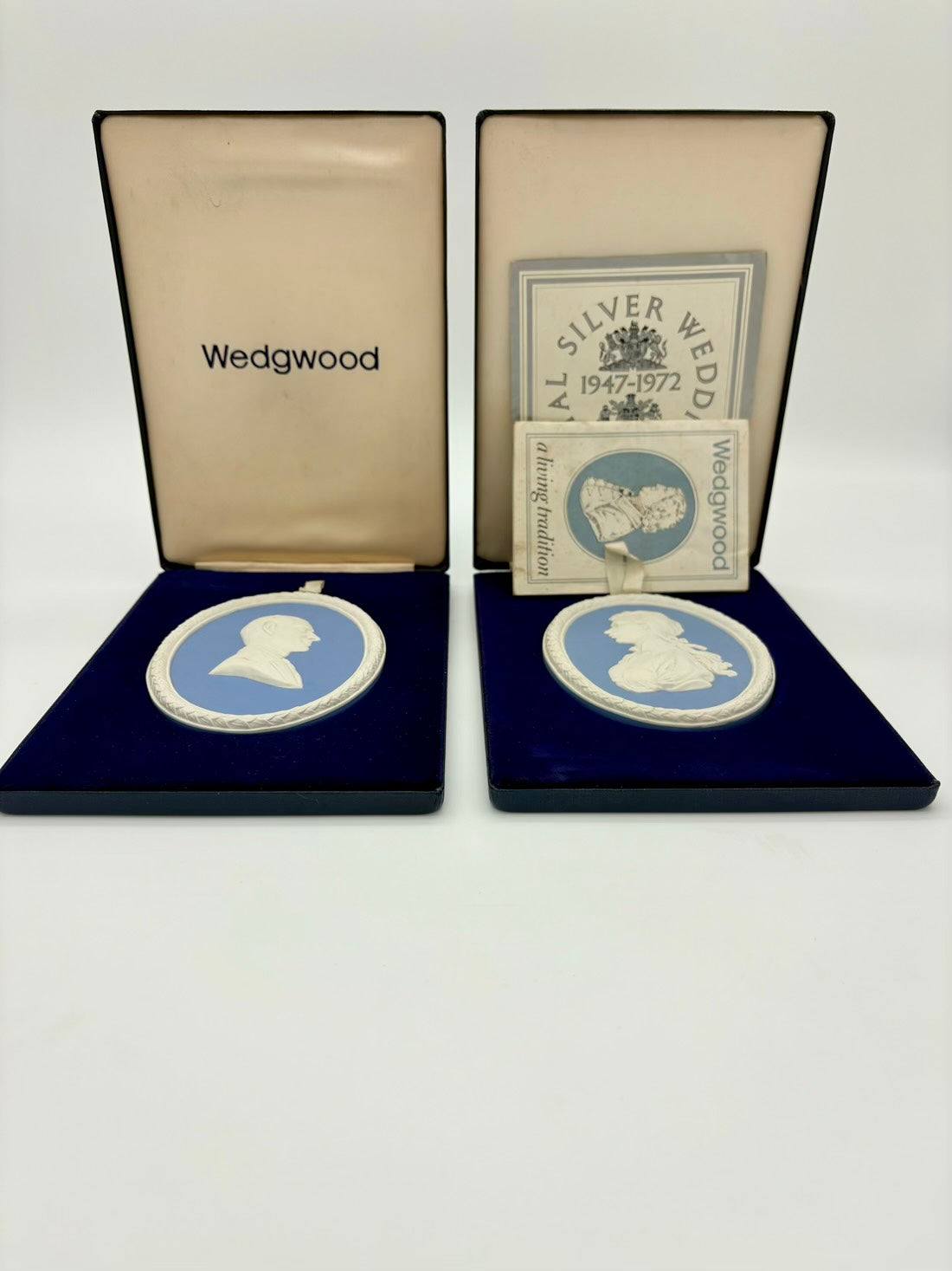 Wedgwood silverware case with a medallion and certificate on a white background